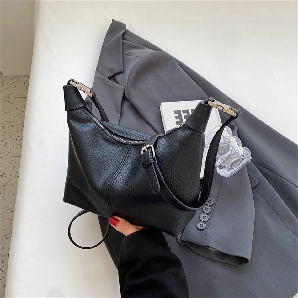 Arken | Roly Crossbody Bag