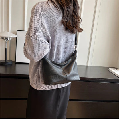 Arken | Roly Crossbody Bag