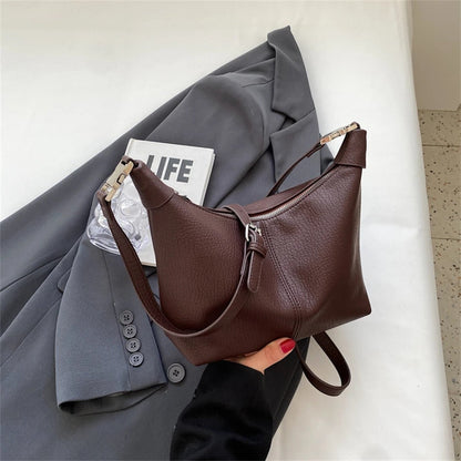 Arken | Roly Crossbody Bag