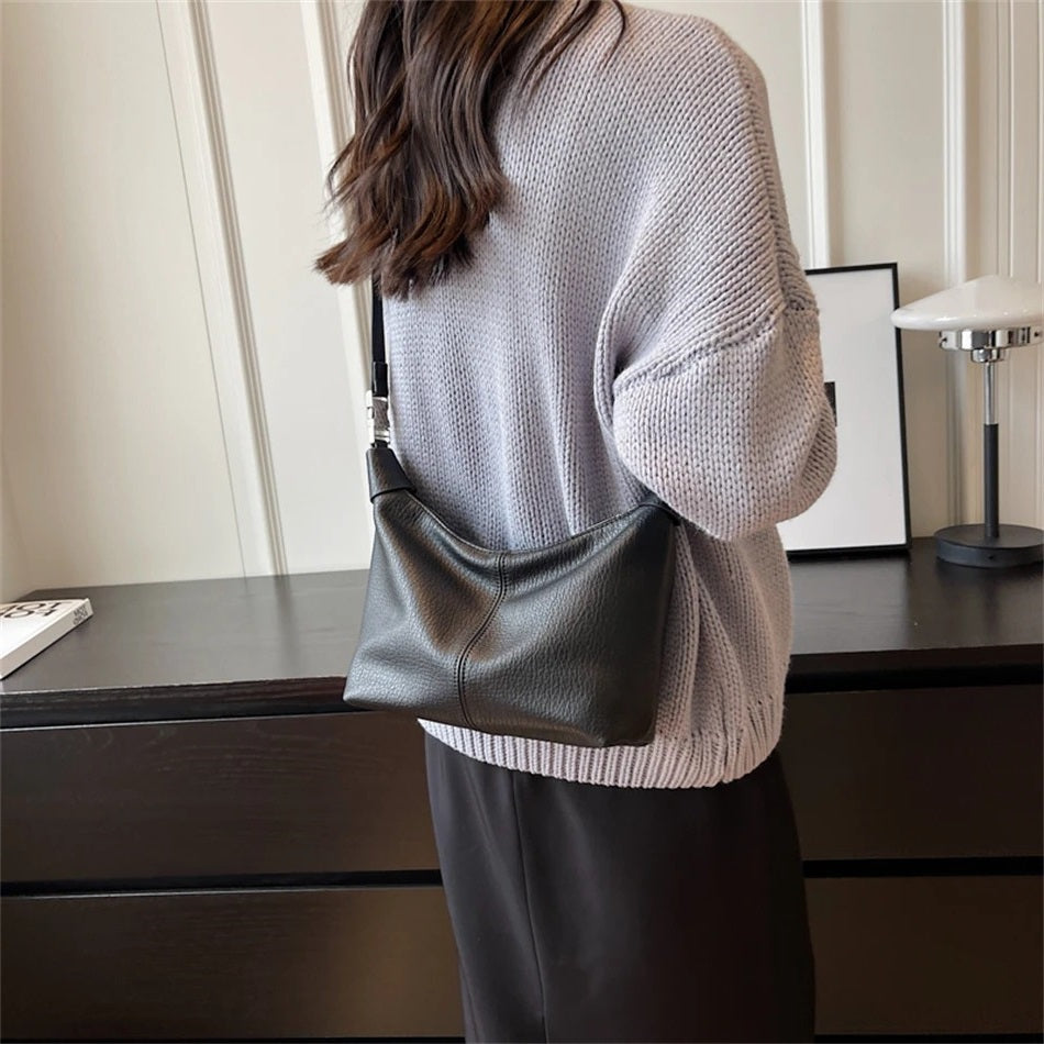 Arken | Roly Crossbody Bag